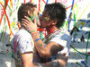 a kiss covered in paint