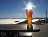 a cool beer atop a mountain.