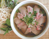 a bowl of pho