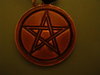 a copper pentagram pendant